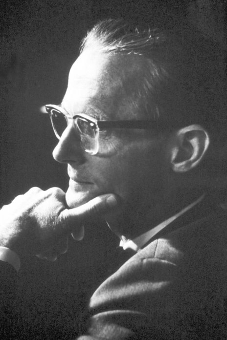 black and white photo of man with glasses